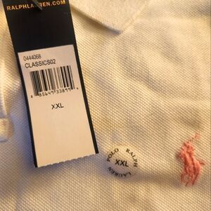 Men's tailored fit Ralph Lauren Polo shirt White with pink polo emblem .